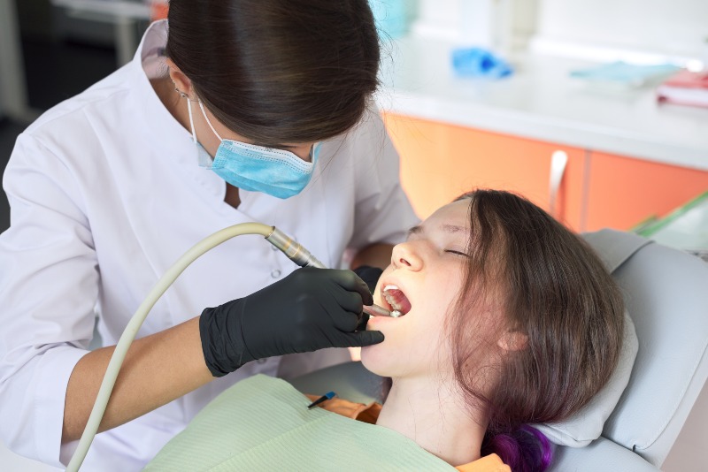 Young girl getting pediatric sedation for dental treatment in Pflugerville, TX